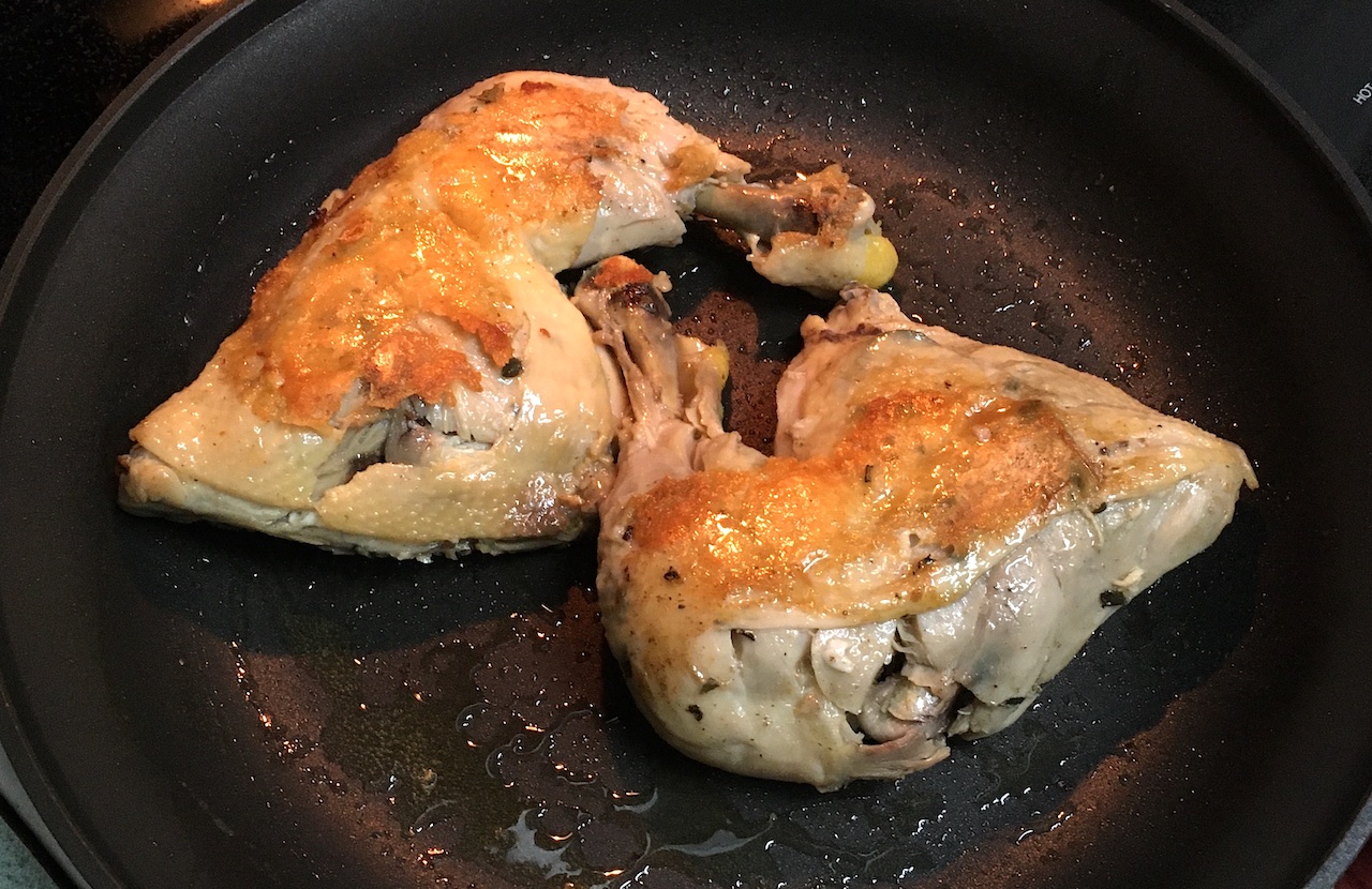 seared chicken confit in pan